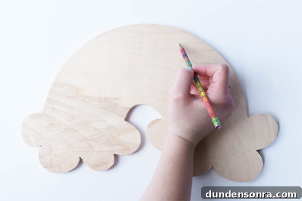Someone painting on a wood board