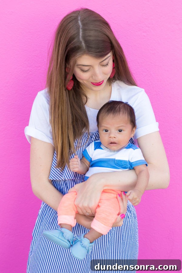 A woman holding a baby