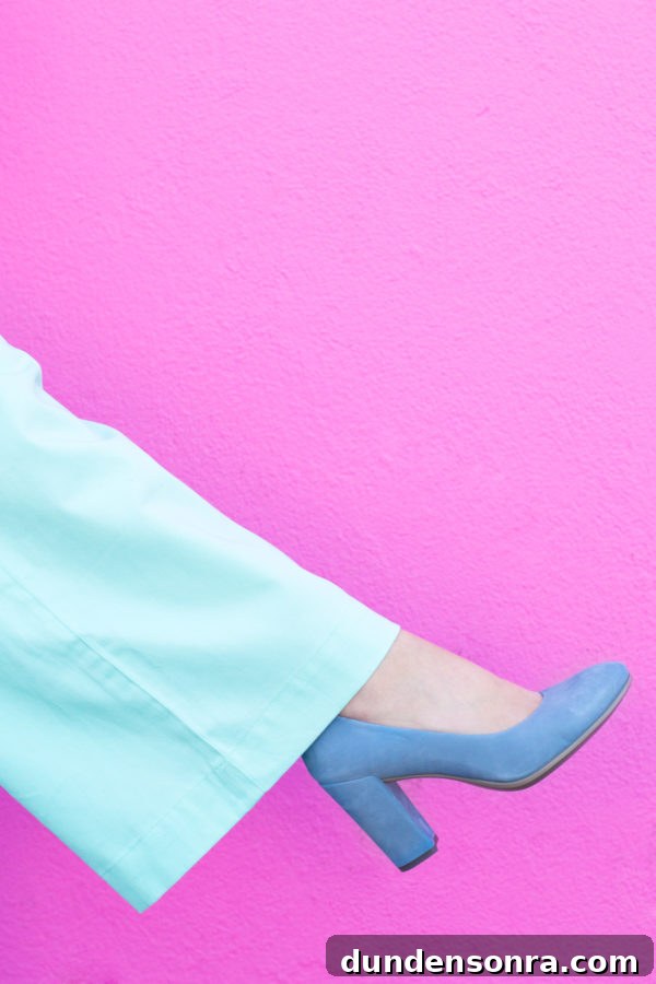 A person wearing a blue high heel
