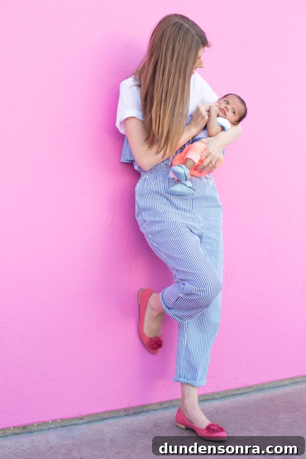 A woman holding a baby