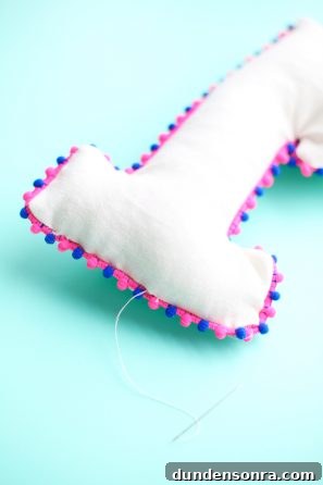 Pillow with colorful stitching 