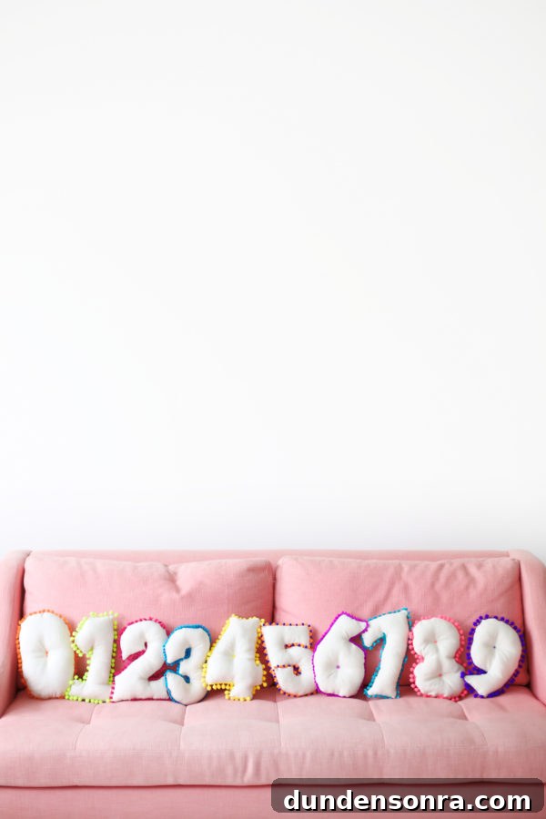 A sofa in a room with pillows