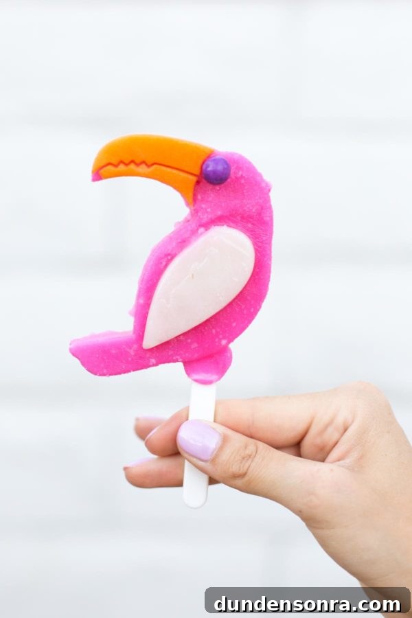 Someone holding a tropical popsicle 