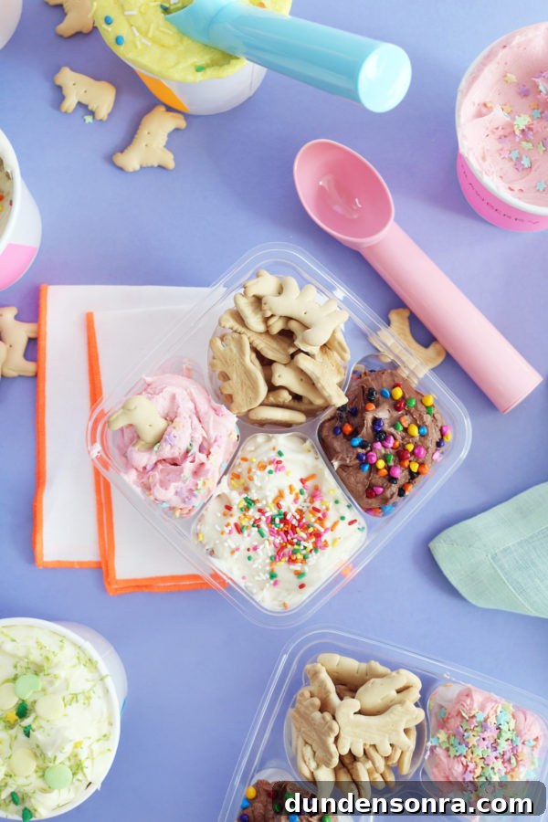 A box filled with different types of food on a table, with Dunkaroos and Ice Cream