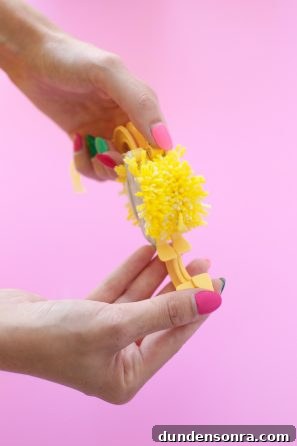 Someone holding yellow string