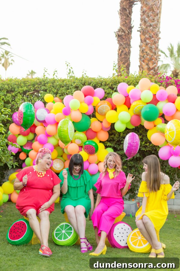 People in front of colorful balloons