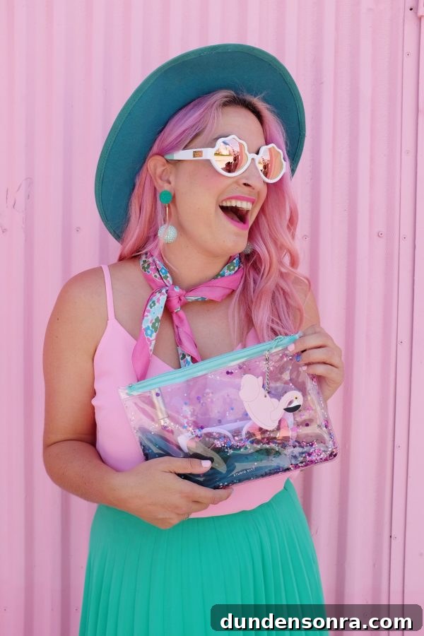 What's In My Clutch: Hot Pink Pineapple Accessories 2 A girl holding an ocean clutch