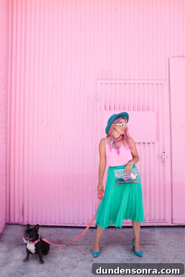 What's In My Clutch: Hot Pink Pineapple Accessories 5 A person standing in front of a pink building
