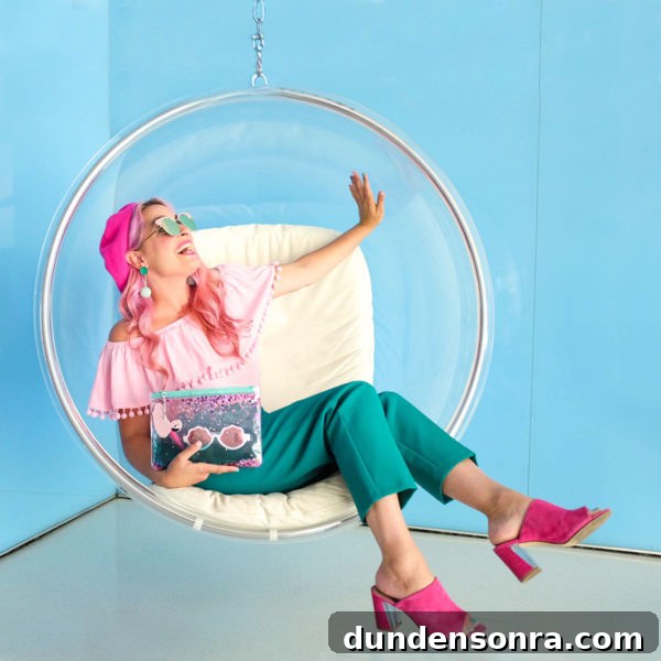 What's In My Clutch: Hot Pink Pineapple Accessories 6 A girl sitting in a bubble chair