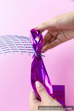 Make Your Own Mylar Party Streamers: Simple DIY Guide 5 Paper and hands