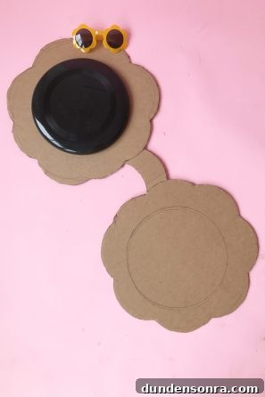 Cardboard on pink table 