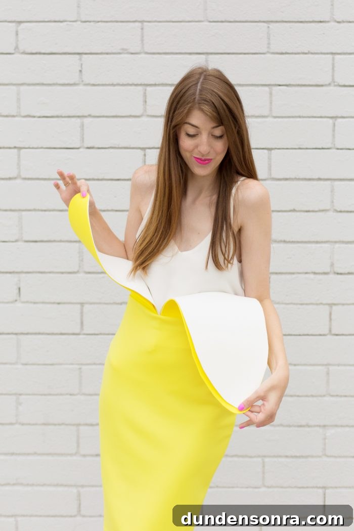 How to Make a DIY Banana Costume: Simple Steps for Any Occasion 2 A woman standing in front of a brick wall, with Banana Costume