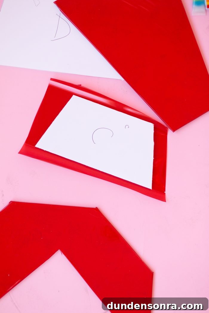 DIY Ring Pop Costume Ideas for a Show-Stopping Halloween 6 Red and white paper cut outs