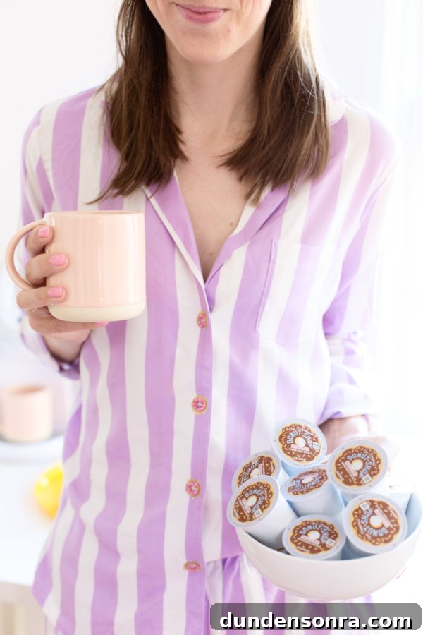 DIY Donut Button Pajamas and Our New Weekend Morning Routine 12 A person holding a cup and creamers