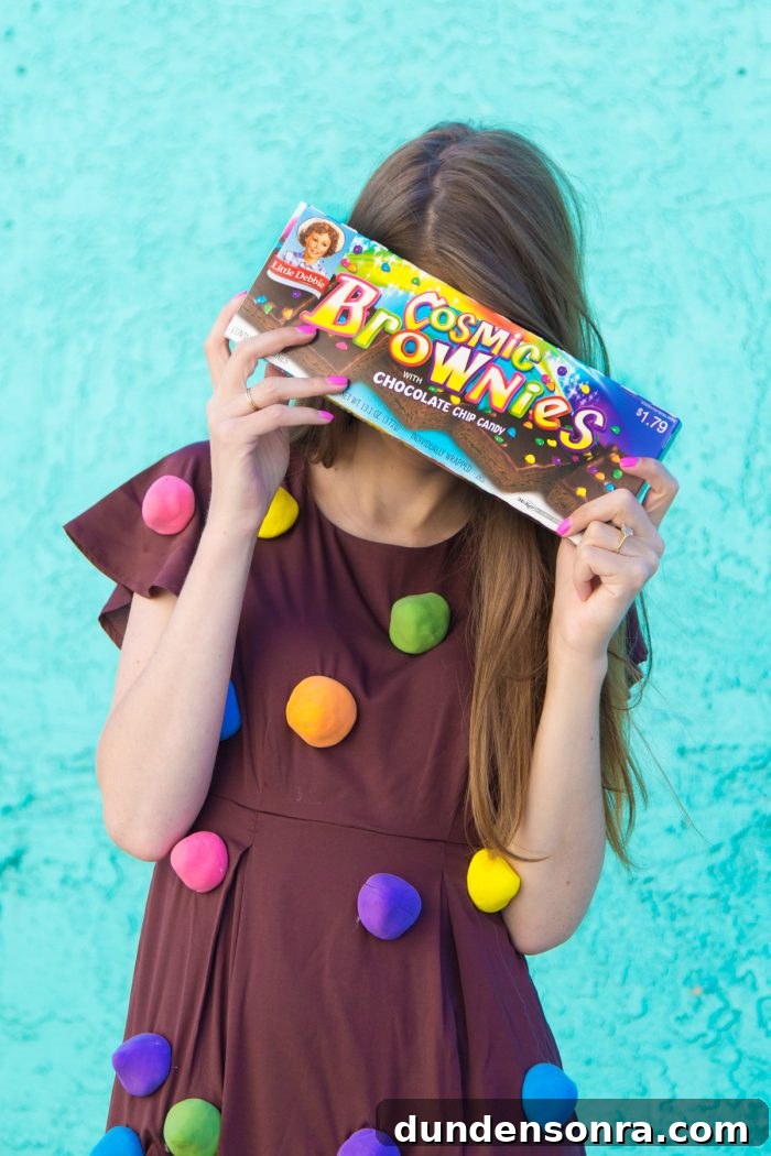 A person wearing a cosmic brownie costume
