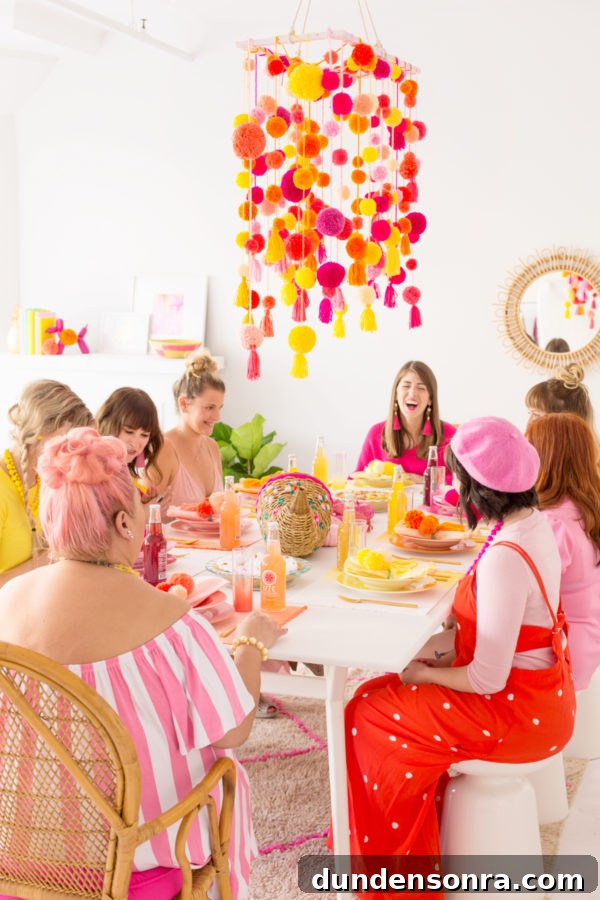 Thank You for Being a Friend: Pom-Pom Filled Friendsgiving Celebration 13 A group of people sitting at a table