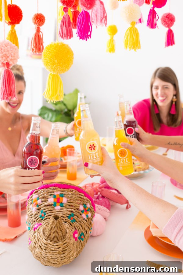 Thank You for Being a Friend: Pom-Pom Filled Friendsgiving Celebration 18 A group drinking izze drinks