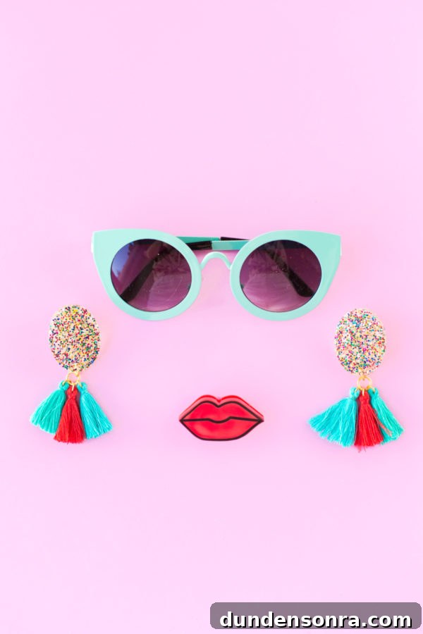 Aqua glasses and glitter tassel earrings