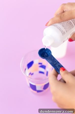 Someone pouring glue
