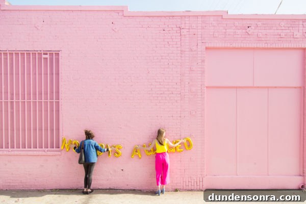2017 Year in Review and What to Expect in 2018 5 Two people standing in front of a building