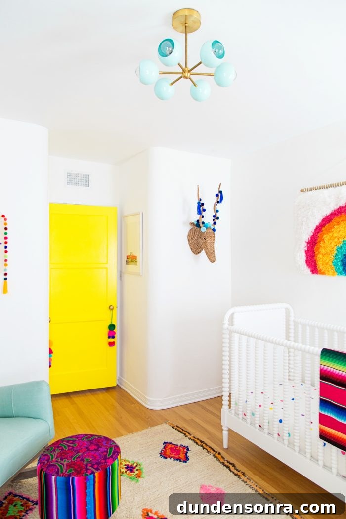 Colorful Rainbow Nursery Design Ideas for Babies and Toddlers 14 A room with a yellow door