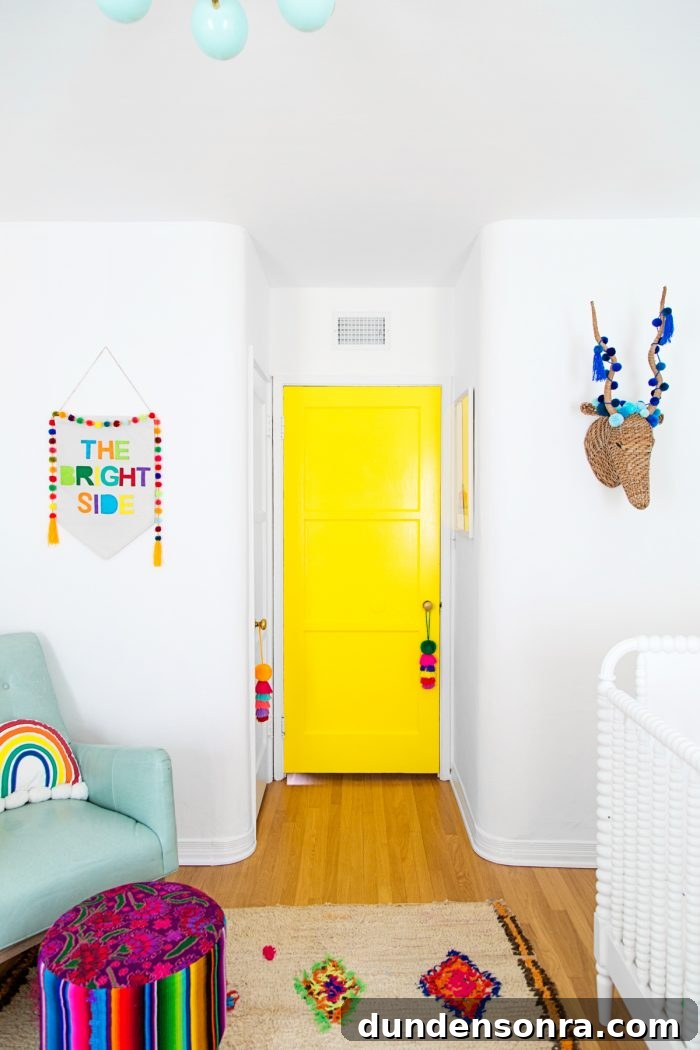 Colorful Rainbow Nursery Design Ideas for Babies and Toddlers 3 A bedroom with a yellow door