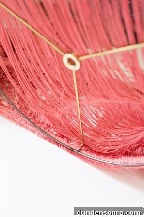 DIY Fringe Chandelier: Step-by-Step Guide to Make One at Home 6 A close up of pink fringe