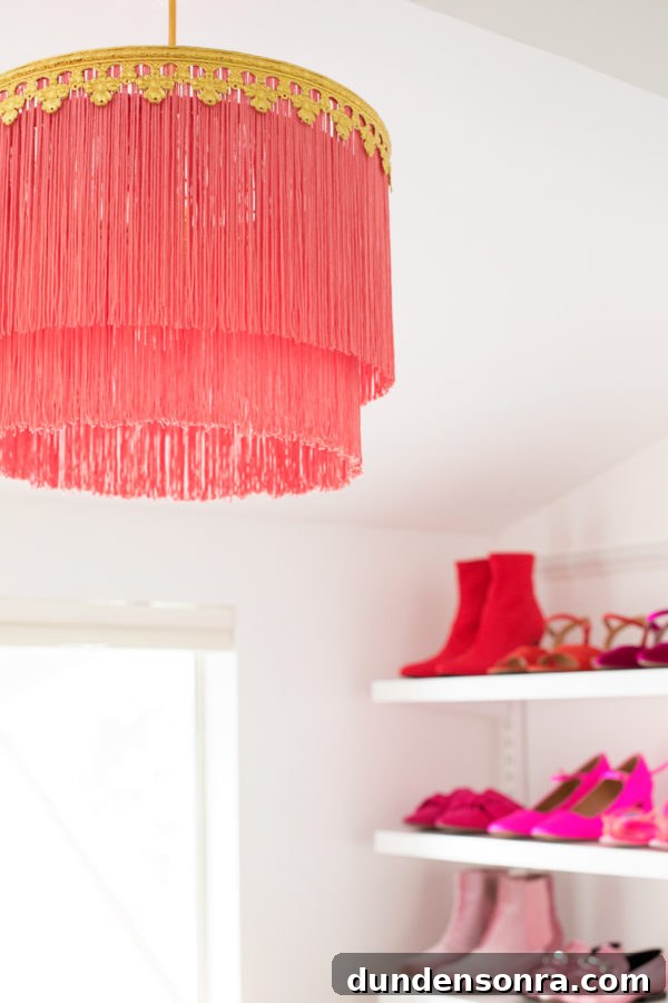 DIY Fringe Chandelier: Step-by-Step Guide to Make One at Home 8 A close up of a pink chandelier