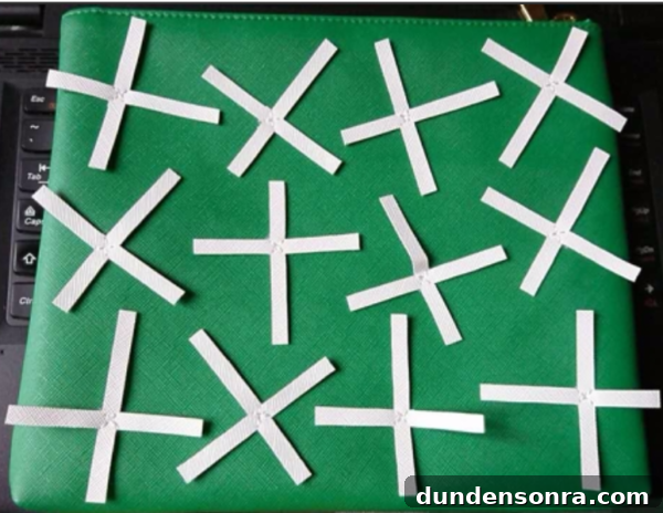 Behind the Scenes: Crafting Our Cactus Clutch Handbag 7 White paper on green background