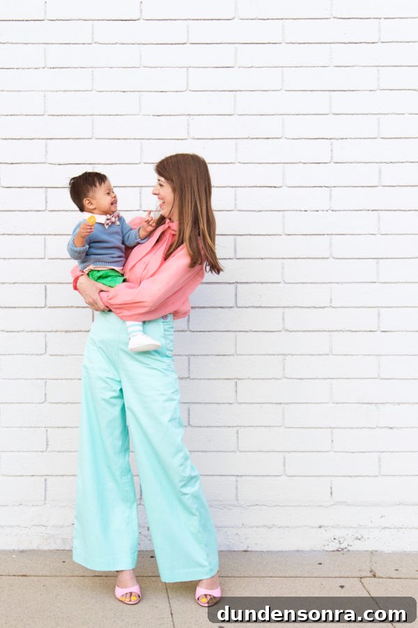 Family-Style Easter Menu: Crowd-Pleasing Recipes for the Table 9 A woman holding a little boy in front of a white wall