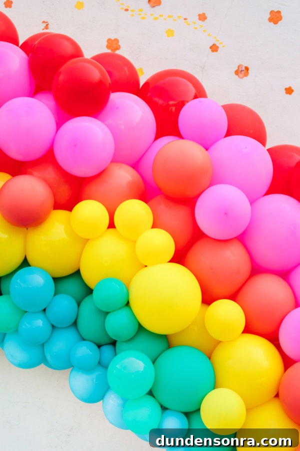 Arlo’s To Infinity and Beyond First Birthday Party Ideas 9 Rainbow balloons