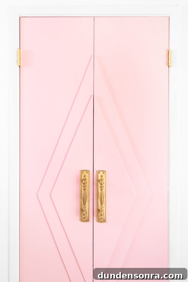 DIY Guide: Transform a Pink Closet with French Doors 11 Pink door with gold handles