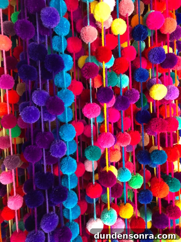 A group of colorful pom poms
