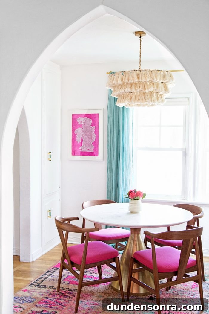 A dining room table with chairs