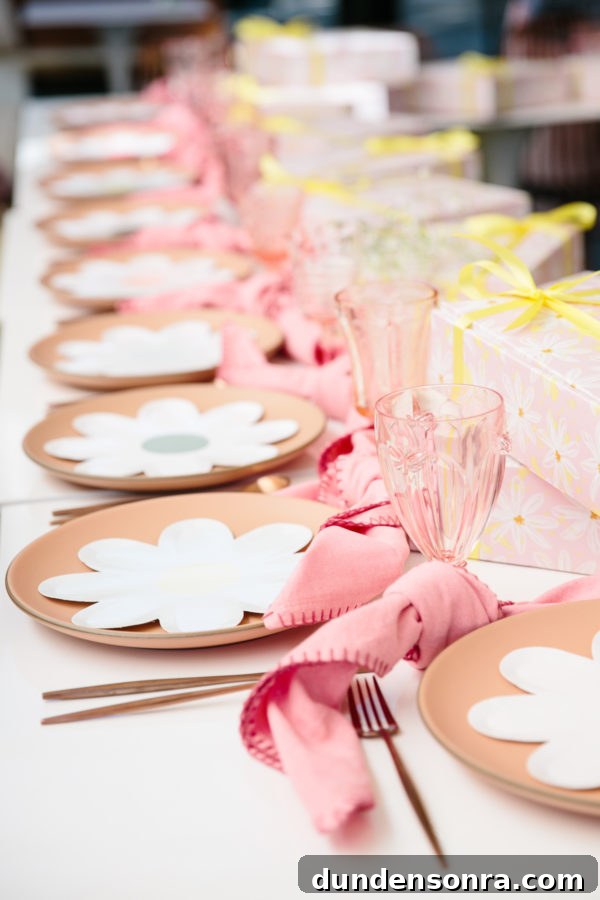 Plates set with glasses and utensils