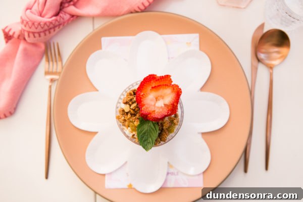 A plate with strawberries and granola