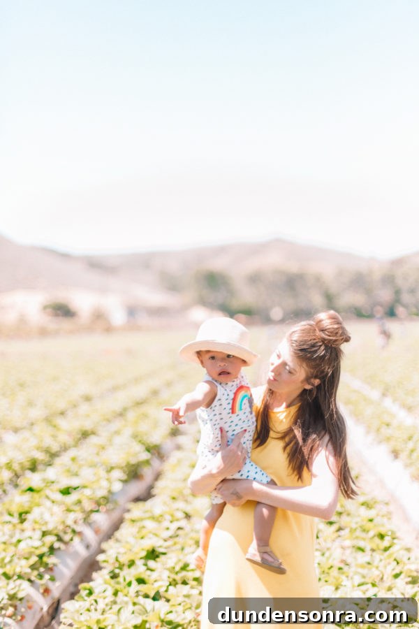 A mom with her son in a field