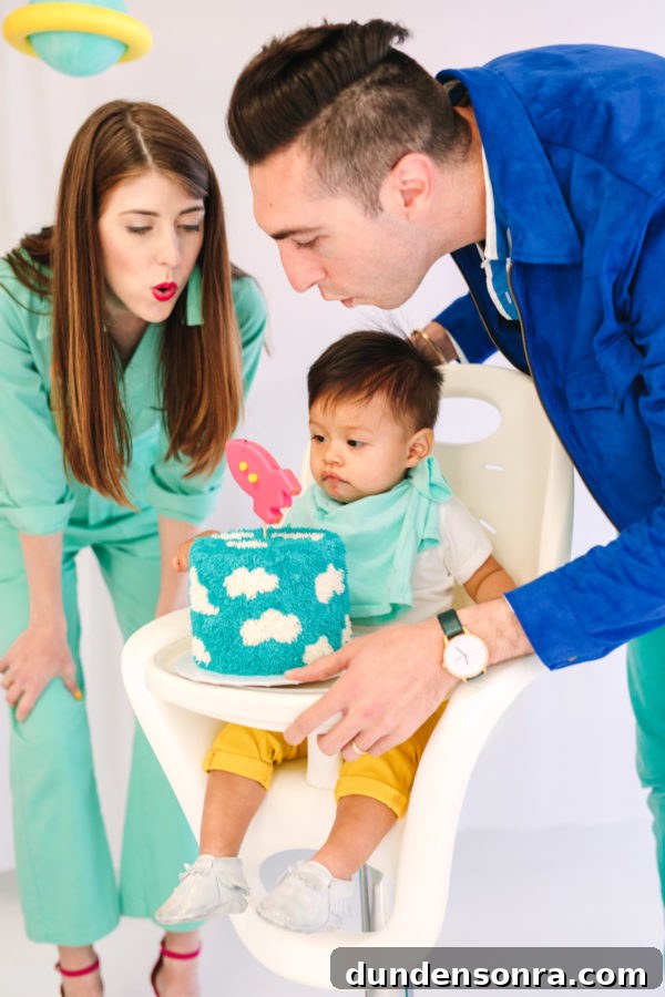 A little boy with a cloud cake