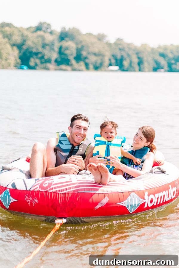 Family Lake Getaway: A Weekend of Fun, Fishing, and Relaxation 2 A group of people sitting on a raft