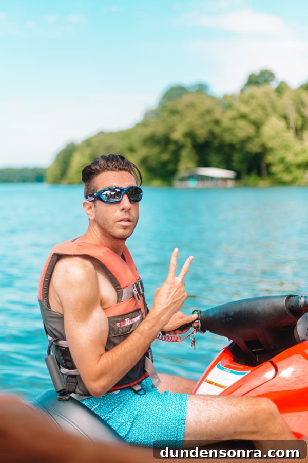 Family Lake Getaway: A Weekend of Fun, Fishing, and Relaxation 11 A person riding a jet ski