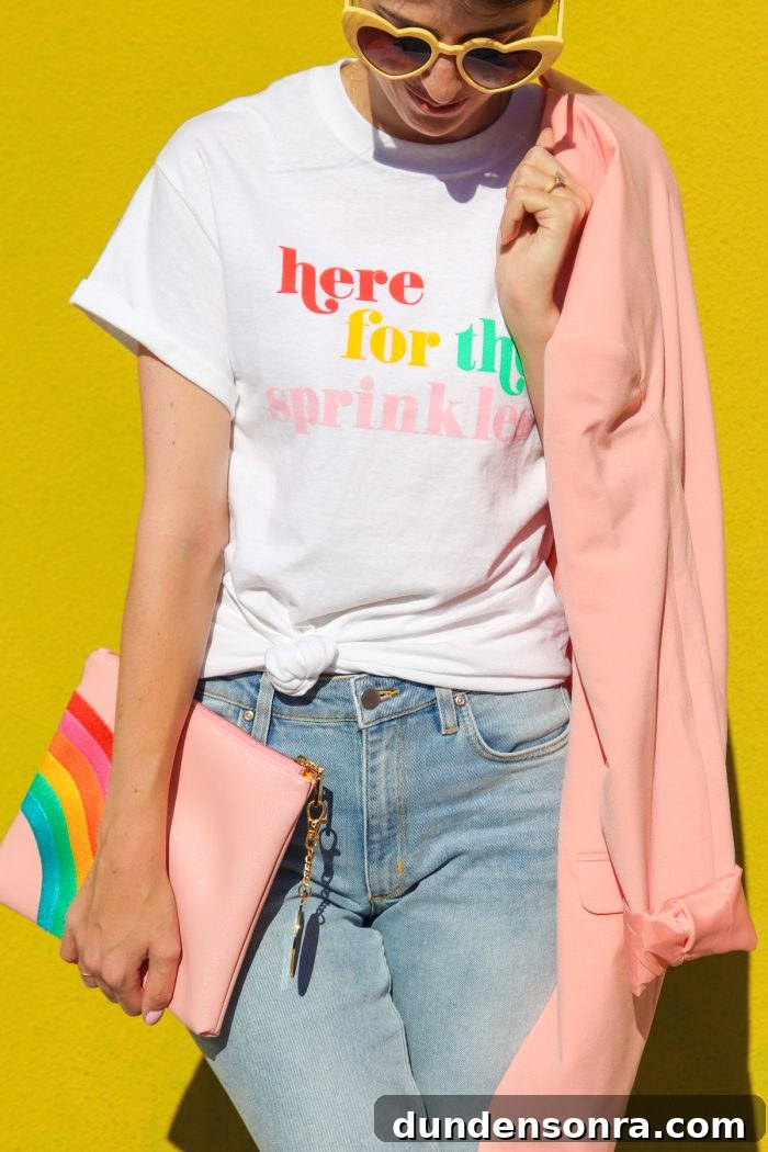Someone wearing a shirt with rainbow words
