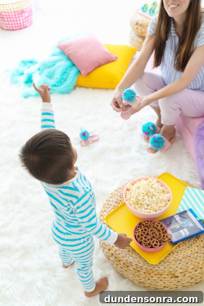 Child with snacks on an ottoman and white faux fur rug
