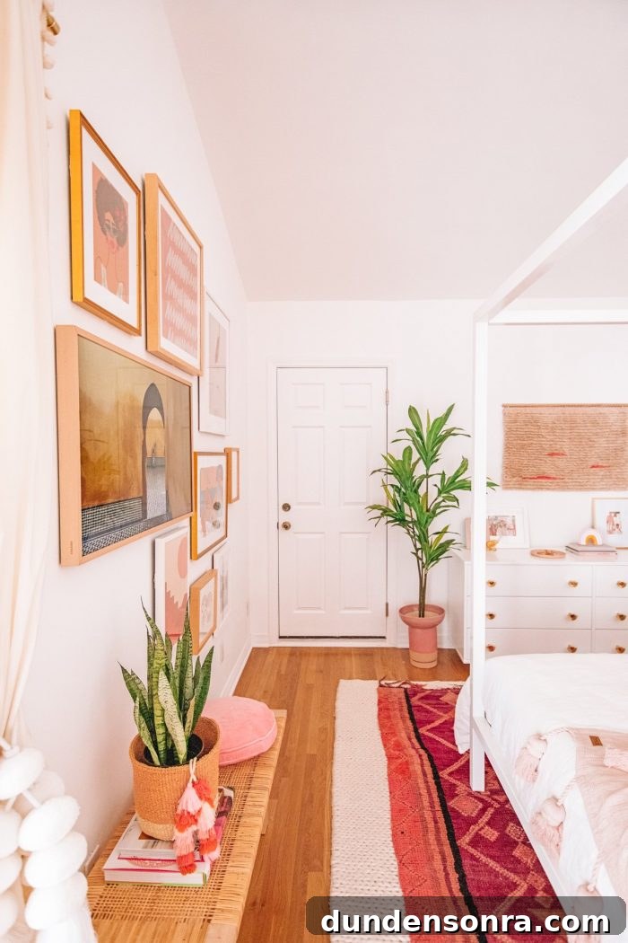 A room filled with furniture, art, and plants