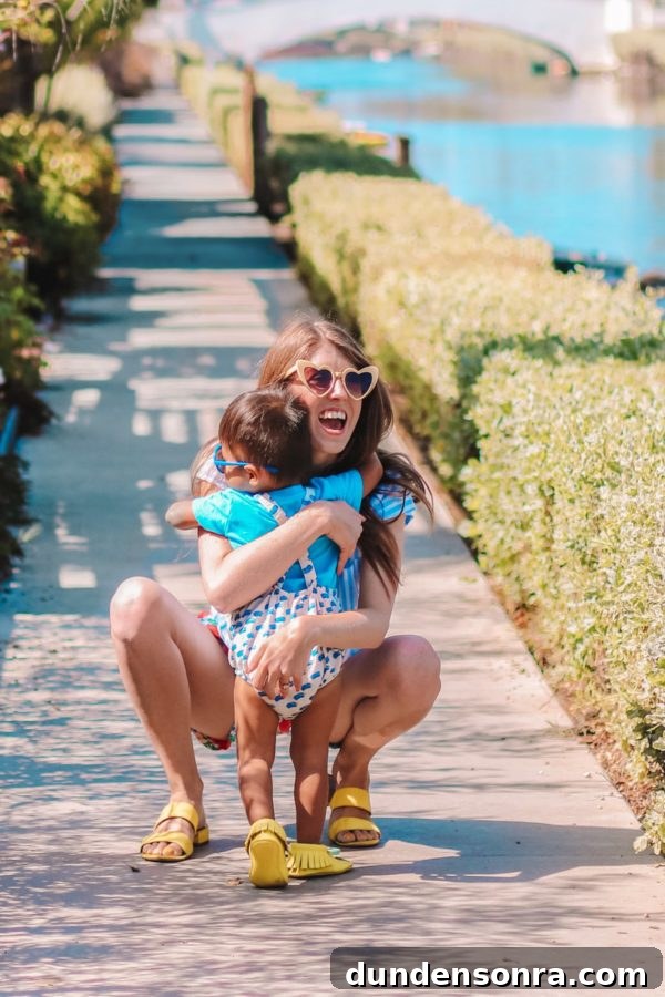 A woman holding a little boy