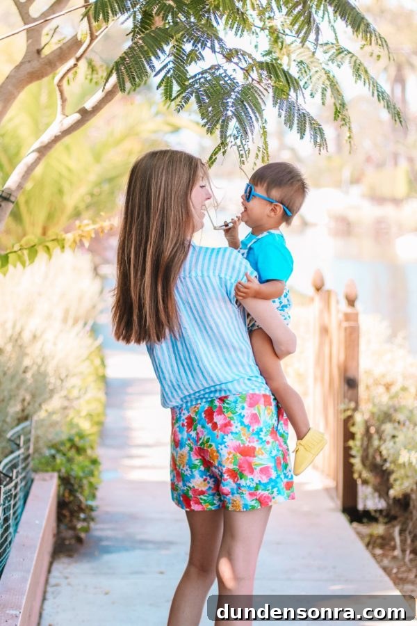 A woman holding a little boy
