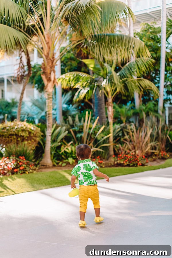 Our Family Getaway to Coronado Island: Top Things to Do 3 A person standing next to a palm tree