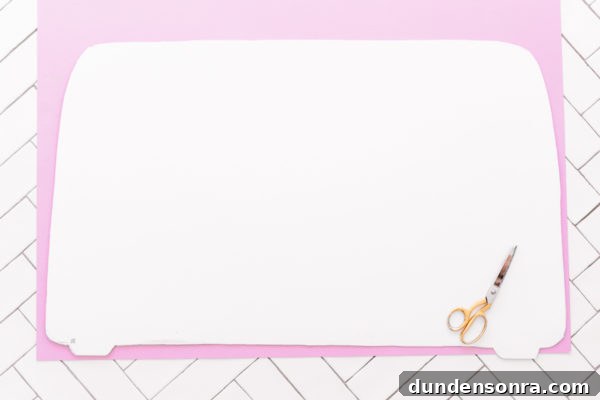 Pink fabric being cut