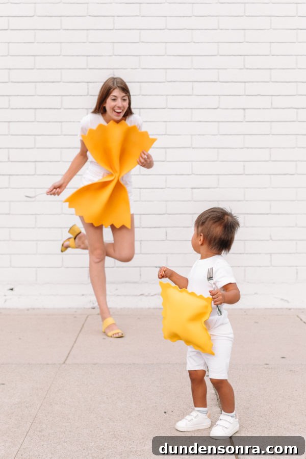 Two people dressed as pasta