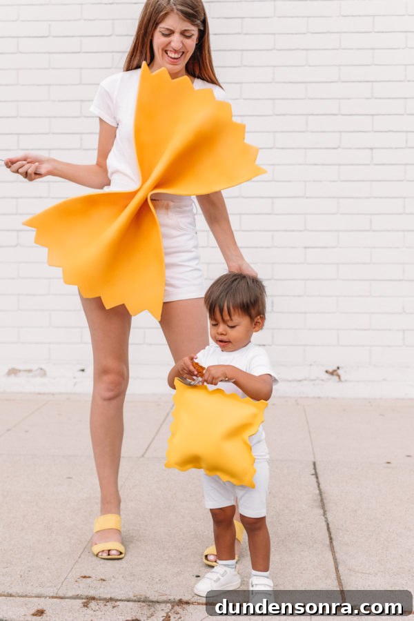 Two people dressed as pasta