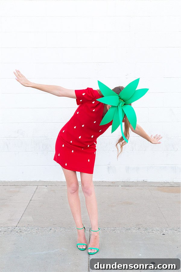 A woman dressed as a strawberry